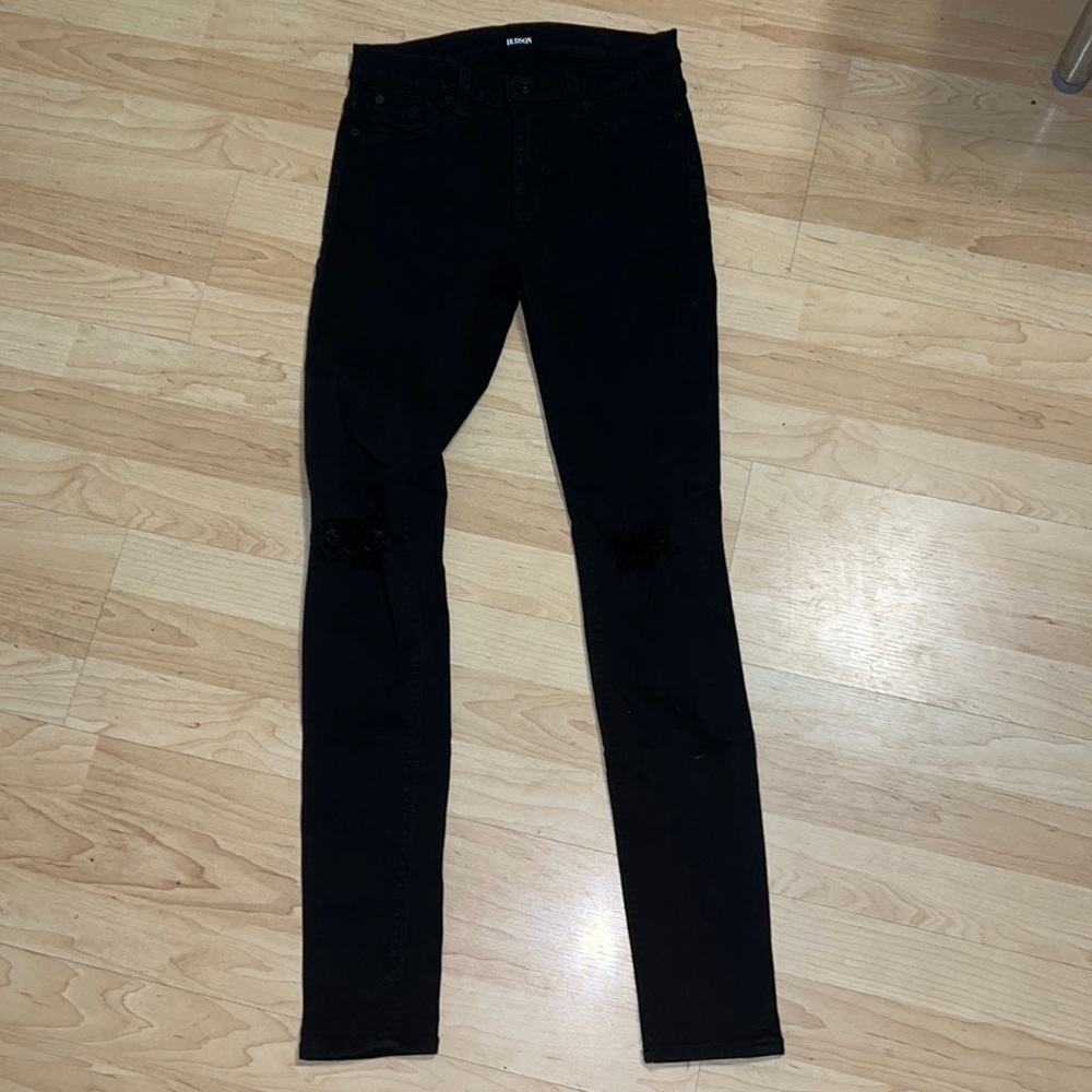 Black jeans with ripped knees